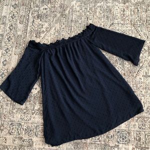 Off the shoulder dress.